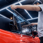 Adding window tint to red car beyond auto protection Vancouver